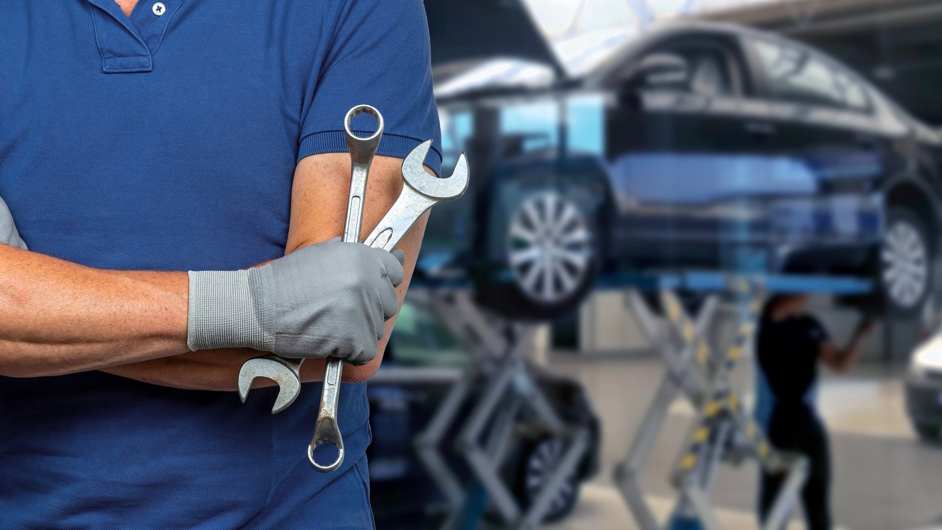Mechanic in auto repair workshop